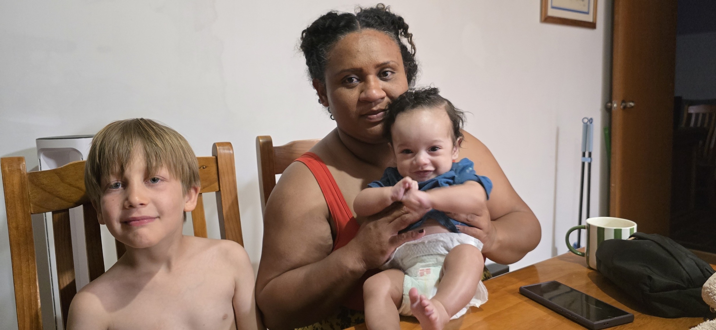 The whole family — Mum, big brother Elliot, and baby Matteo. Before we knew.